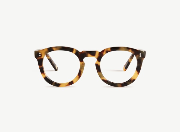 Front view of a pair of eyeglasses called the Charmer in Turtle