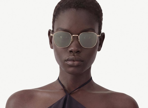 Front view of a pair of eyeglasses called the Trendsetter in Gold