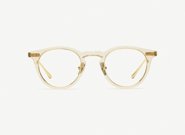 Front view of a pair of eyeglasses called the Alchemist in Nude