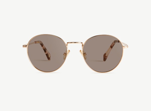 Front view of a pair of eyeglasses called the Virtuoso in Rose Gold