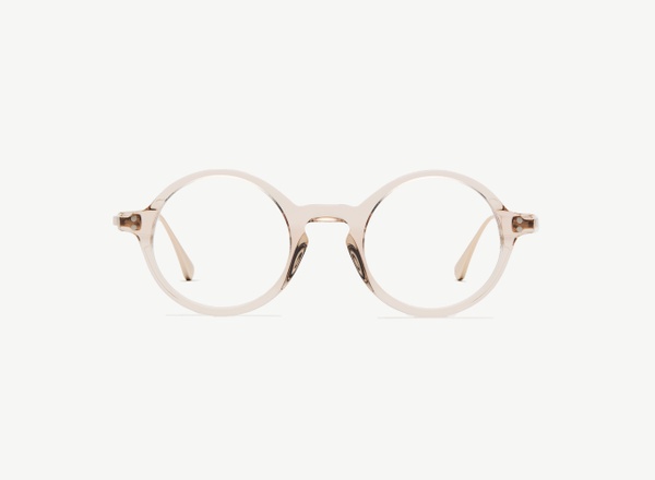 Front view of a pair of eyeglasses called the Curator in Nude