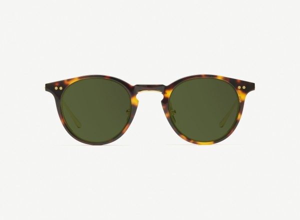 Front view of a pair of eyeglasses called the Alchemist in Tortoise
