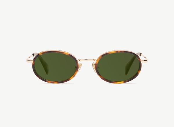 Front view of a pair of eyeglasses called the Vogue in Tortoise