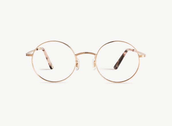 Front view of a pair of eyeglasses called the Stargazer in Rose Gold