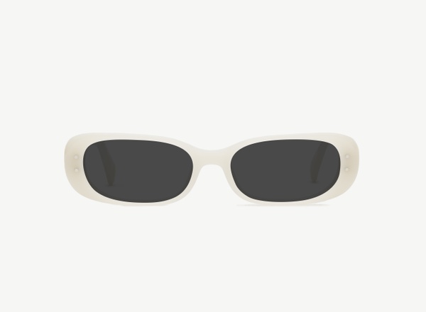 Front view of a pair of eyeglasses called the Nomad in Ivory