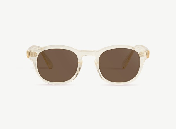 Front view of a pair of eyeglasses called the Optimist in Champagne