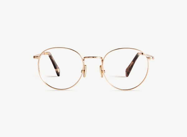 Front view of a pair of eyeglasses called the Daydreamer in Rose Gold