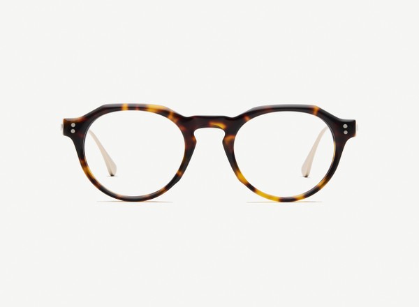 Front view of a pair of eyeglasses called the Editor in Tortoise