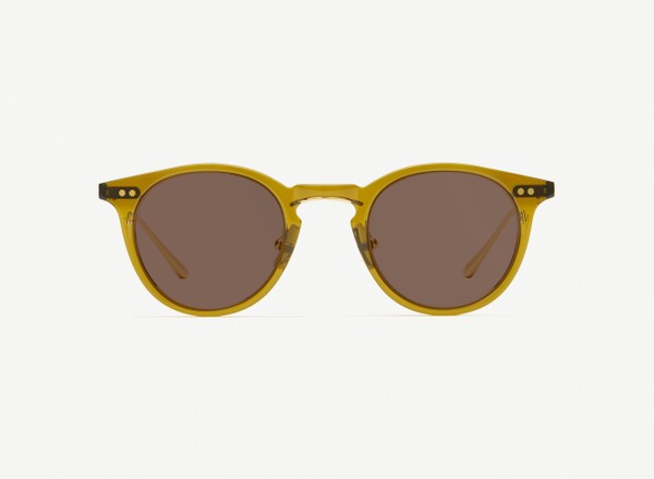 Front view of a pair of eyeglasses called the Alchemist in Olive