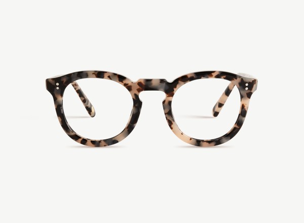 Front view of a pair of eyeglasses called the Charmer in Latte
