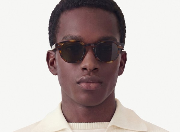 Front view of a pair of eyeglasses called the Performer in Tobacco