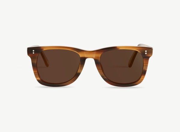 Front view of a pair of eyeglasses called the Mentor in Walnut