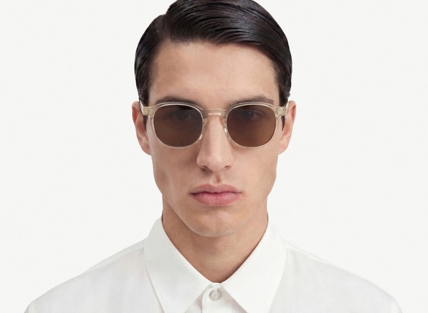 Front view of a pair of eyeglasses called the Idealist in Champagne