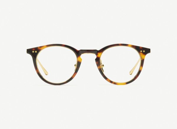 Front view of a pair of eyeglasses called the Alchemist in Tortoise