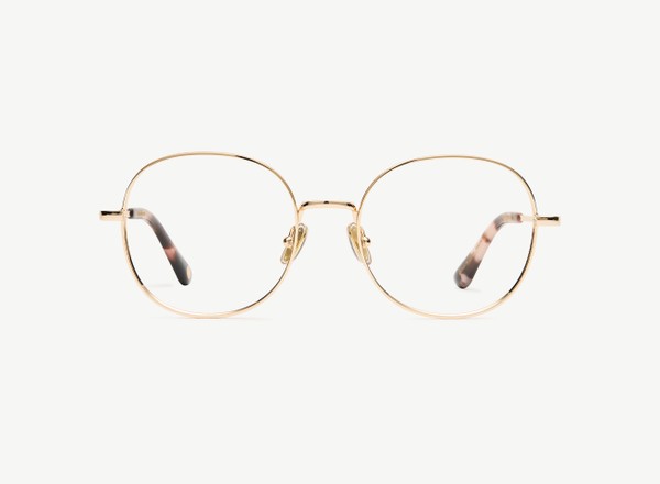 Front view of a pair of eyeglasses called the Guardian in Rose Gold
