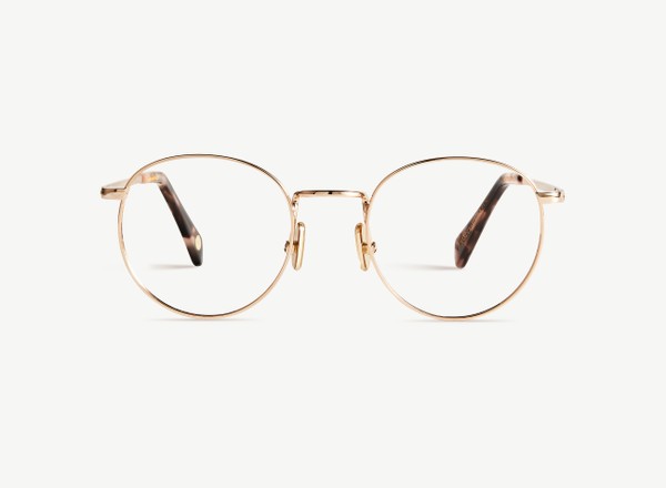 Front view of a pair of eyeglasses called the Daydreamer in Rose Gold