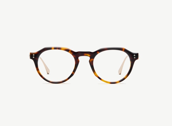 Front view of a pair of eyeglasses called the Editor in Tortoise