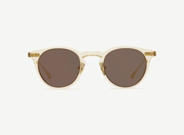 Front view of a pair of eyeglasses called the Alchemist in Nude