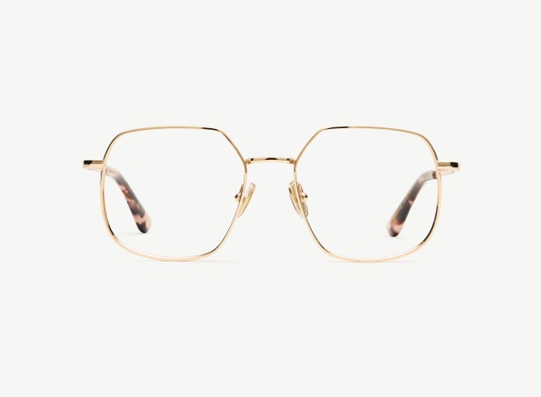 Front view of a pair of eyeglasses called the Maestra in Rose Gold