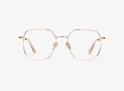 A pair of eyeglasses called the Maestra in Gold colour