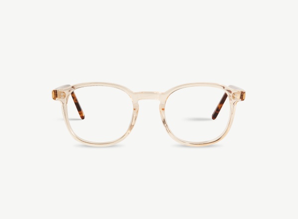 Front view of a pair of eyeglasses called the Idealist in Tan