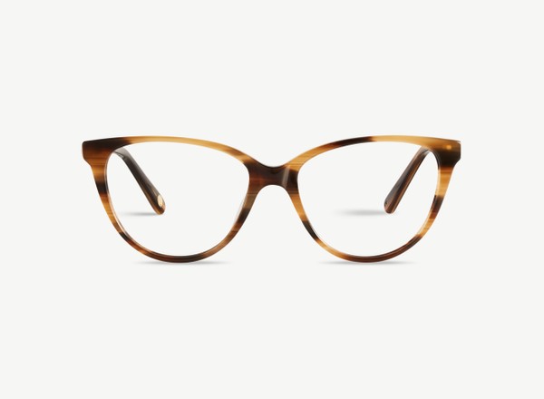 Front view of a pair of eyeglasses called the Cutie in Walnut