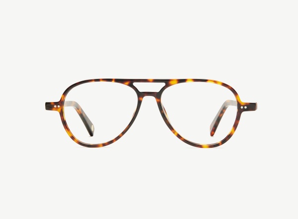Front view of a pair of eyeglasses called the Radical in Tortoise