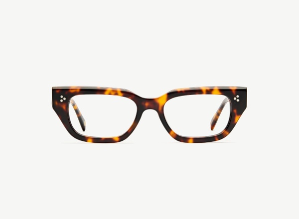Front view of a pair of eyeglasses called the Publicist in Tortoise
