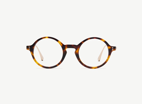 Front view of a pair of eyeglasses called the Curator in Tortoise