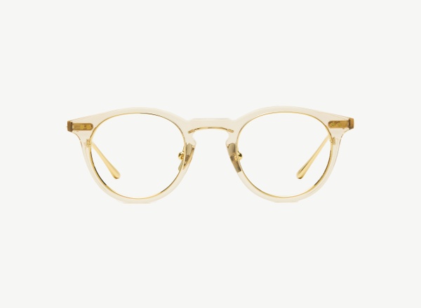 Front view of a pair of eyeglasses called the Alchemist in Nude