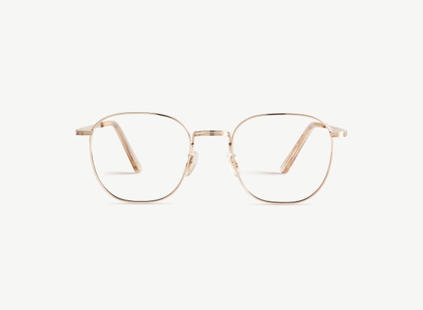 Front view of a pair of eyeglasses called the Trendsetter in Gold