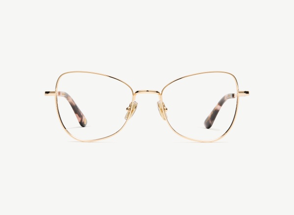 Front view of a pair of eyeglasses called the Muse in Rose Gold