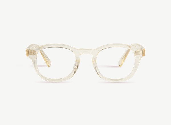Front view of a pair of eyeglasses called the Optimist in Champagne
