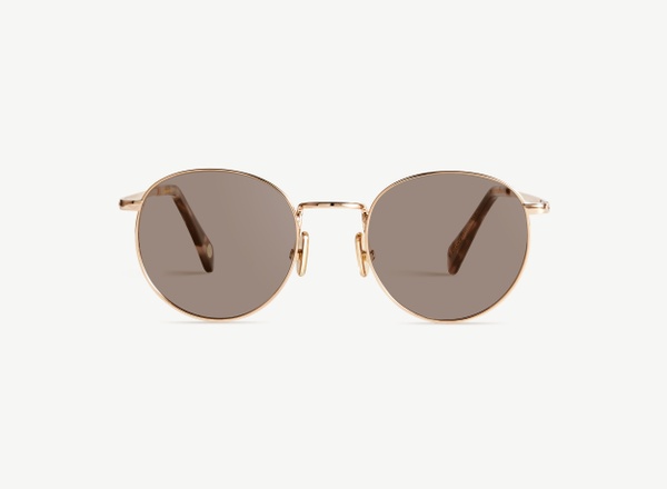Front view of a pair of eyeglasses called the Daydreamer in Rose Gold