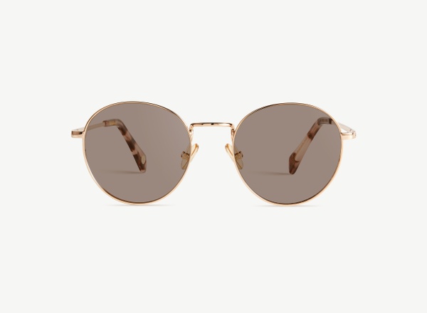 Front view of a pair of eyeglasses called the Virtuoso in Rose Gold