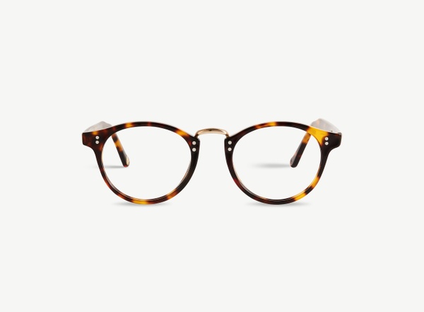 Front view of a pair of eyeglasses called the Saint in Tortoise