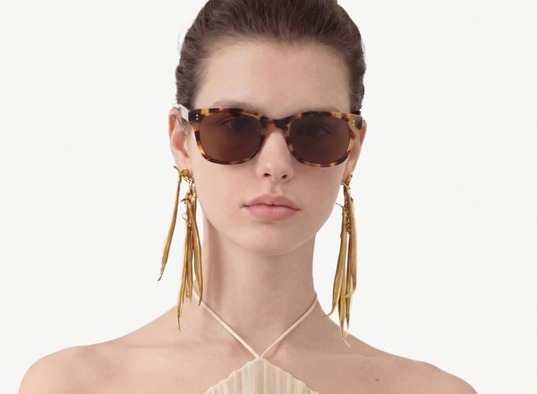 Front view of a pair of eyeglasses called the Creator in Camel