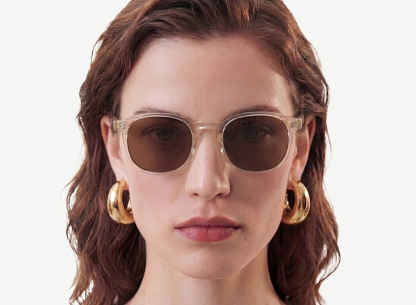 Front view of a pair of eyeglasses called the Idealist in Champagne