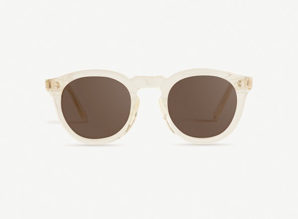 Front view of a pair of eyeglasses called the Charmer in Champagne