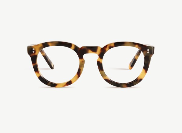 Front view of a pair of eyeglasses called the Charmer in Turtle