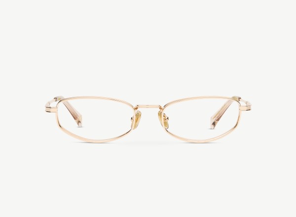 A pair of eyeglasses called the Whisperer in Gold colour