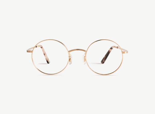 Front view of a pair of eyeglasses called the Stargazer in Rose Gold