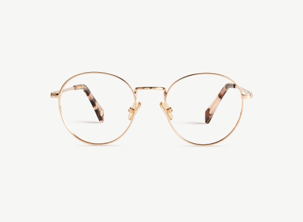 Front view of a pair of eyeglasses called the Virtuoso in Rose Gold