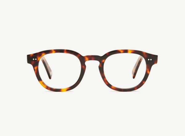 Front view of a pair of eyeglasses called the Performer in Tortoise