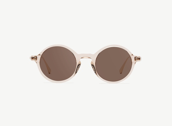 Front view of a pair of eyeglasses called the Curator in Nude