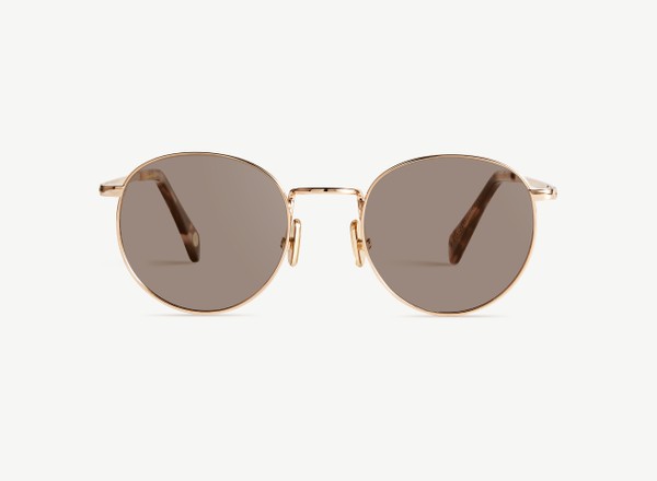 Front view of a pair of eyeglasses called the Daydreamer in Rose Gold