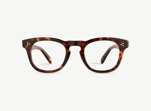 Front view of a pair of eyeglasses called the Diva in Tortoise