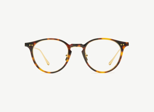 Front view of a pair of eyeglasses called the Lyricist in Tortoise
