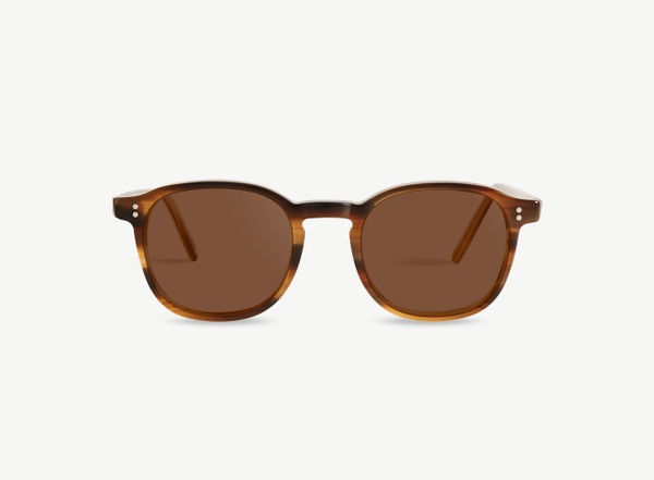 Front view of a pair of eyeglasses called the Idealist in Walnut