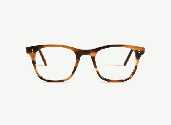 Front view of a pair of eyeglasses called the Bookworm in Walnut